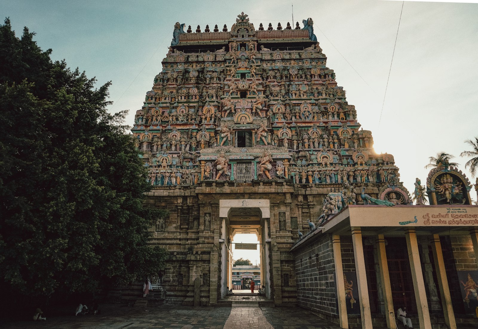 An ornate ancient indian temple gopuram at sunset